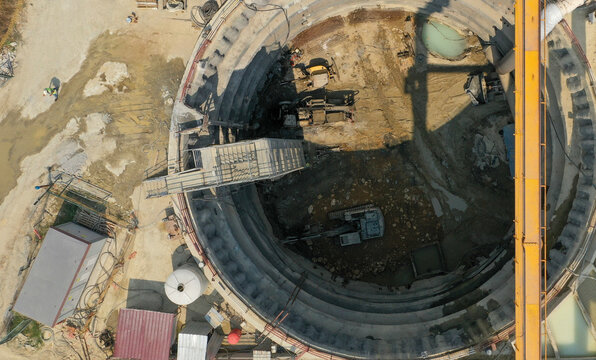 Overview of construction site with tunnel excavation