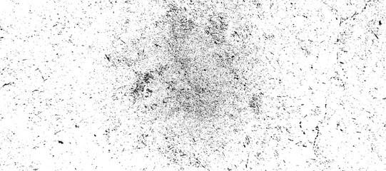 A subtle black and white grunge effect featuring central fine particles and faint surface imperfections. vector