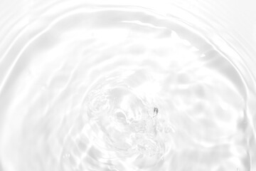 Bright Minimalist Water Ripples with Soft Light Reflections in Focus