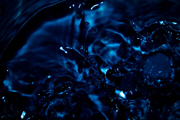 Deep Blue Water Texture with Ripples and Bubbles in Motion
