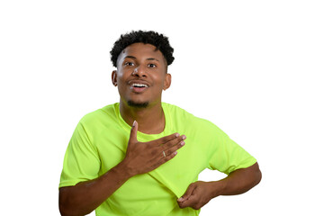 A young man in a neon green shirt, excited and beating his chest, celebrates his victory.