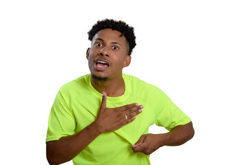 Expressive young man in a colorful t-shirt, surprised look on his face, hand on his chest. Celebrating victory.
