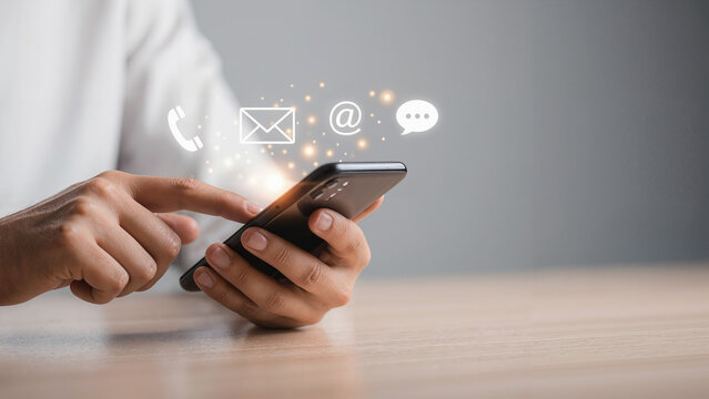 Using a mobile phone to contact and communicate through various digital channels like email and messages for business and personal connections