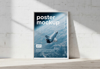 Poster frame against a white wall mockup