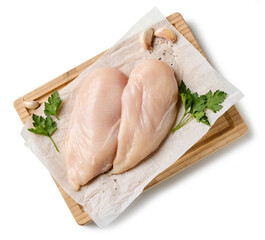 fresh chicken breast meat on cutting board