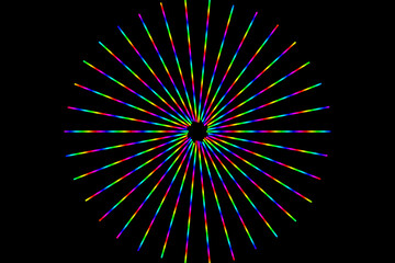 colorful spiral light burst effect on black background