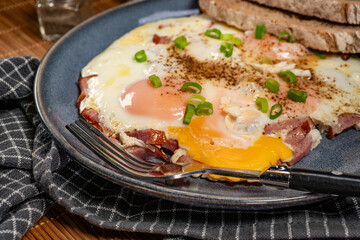 Fried egg and sliced sausage.