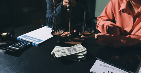 Consultation and conference of professional businesswoman and Male lawyers working and discussion having at law firm in office. Concepts of law, Judge gavel with scales of justice