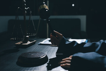 Consultation and conference of professional businesswoman and Male lawyers working and discussion having at law firm in office. Concepts of law, Judge gavel with scales of justice