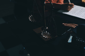 Consultation and conference of professional businesswoman and Male lawyers working and discussion having at law firm in office. Concepts of law, Judge gavel with scales of justice