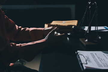 Consultation and conference of professional businesswoman and Male lawyers working and discussion having at law firm in office. Concepts of law, Judge gavel with scales of justice