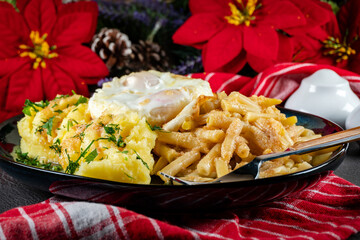 Fried eggs with boiled potatoes and yellow string beans.