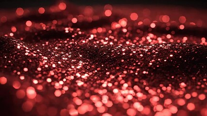 A mesmerizing and vibrant abstract background featuring a dynamic field of shimmering red glitter particles creating a beautiful bokeh effect perfect for festive celebrations holiday greetings or ele.