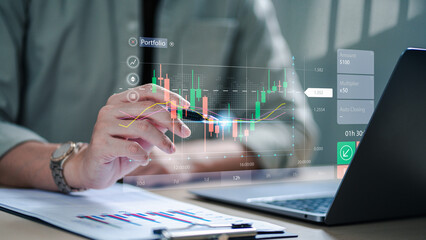 Investor analyzing real-time trading chart with digital portfolio dashboard on laptop, focusing on stock market trends, financial data, and investment strategies. investment, trading, stock, portfolio