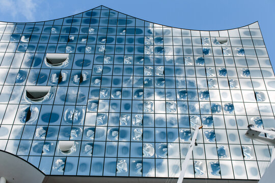 Hamburg, Germany - Glass facade of the Elbphilharmonie against blue sky