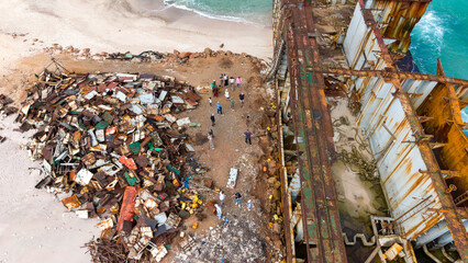 Aerial View of Rusty Shipwreck on Beach
