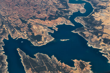Aerial view of Buend&iacute;a Reservoir and surrounding farmland in Spain