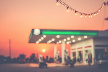 Blurred fuel station background at night representing urban mobility and energy.