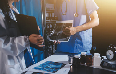 Doctors are meeting at the hospital to discuss treatment options and share experiences with colleagues.