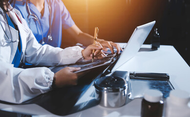 Doctors are meeting at the hospital to discuss treatment options and share experiences with colleagues.