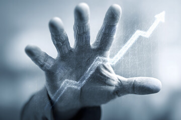 Hand with a rising graph line behind