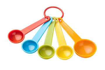 Set of colorful measuring spoons on black background