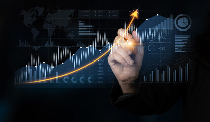 A professional hand illustrates business growth with digital graphs and charts, showcasing financial trends, data analysis, and strategic insights in a modern workspace. Scalp