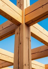 Naklejka premium A detailed view of thick, rough-cut lumber beams providing strong structural support for modern residential or commercial construction, structure, truss, industrial