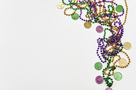 Mardi gras festival beads and doubloons border