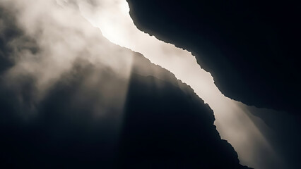 Dramatic Sky with Sun Rays Breaking Through Dark Clouds