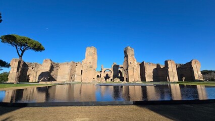 Rome, Italy - 14 January 2025. View of the Baths of Caracalla’s main façade from across a modern...