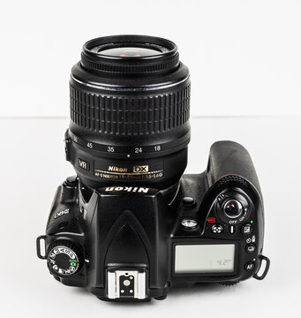 Gothenburg, Sweden - March 30 2025: Top view of Nikon DSLR with zoom lens.