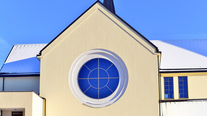 A modern Catholic church on the outskirts of the city.