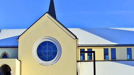 A modern Catholic church on the outskirts of the city.