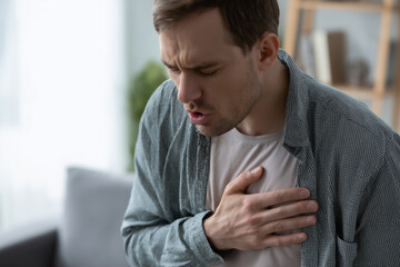 Man Coughing with Chest Pain Respiratory Illness Concept