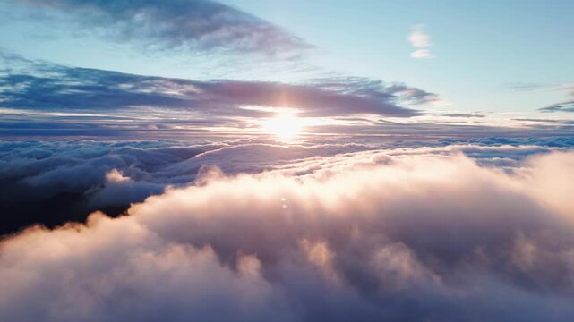 Sunrise over clouds, Morning light illuminates vibrant cloudscape