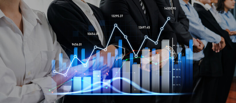 Group of professionals stands together in a modern office while analyzing financial data represented by graphs and charts, highlighting growth and trends. Scalp - Powered by Adobe