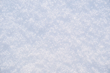 White snow surface showing frozen crystalline texture © EdienuFoto