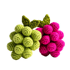 Obraz premium Handmade crochet grapes in vibrant pink and green colors, a charming artistic food representation.