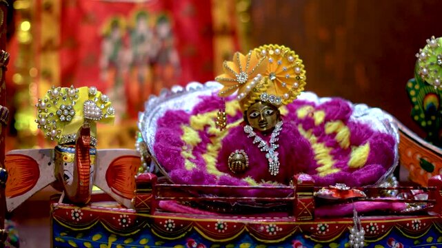 Colorful Laddu Gopal Krishna Idol Decorated with Flowers for Devotion