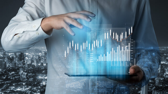 A businessman showcases digital financial data through interactive graphs and charts, emphasizing technology role in modern finance and analytics in a vibrant urban environment. Scalp - Powered by Adobe