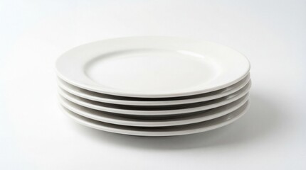 Stack of clean white ceramic dinner plates isolated on white background for kitchen restaurant dining and tableware service concept