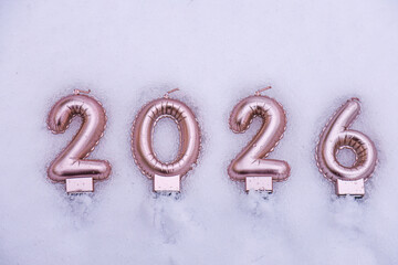 Winter concept with the numbers 2026 laid out on fresh white snow, symbolizing the New Year, seasonal change, and a clean start