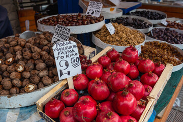 Pomegranates and nuts on Kapani food market in Thessaloniki city, Greece