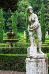 Obraz premium Ancient Statue in Garden
