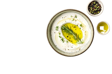 Bowl of sour cream sauce with herbs and olive oil isolated on white background top view