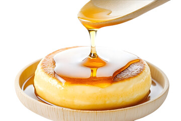 Japanese specialty called souffle pancakes poured with honey isolated on white background