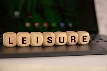 The word leisure consists of individual cubes with letters
