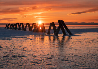 frozen lake at sunset