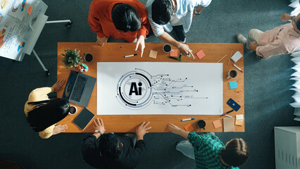 Diverse Team Collaborating on Artificial Intelligence Concept with Data Visualization and Technology Elements on Workspace Table Trope.